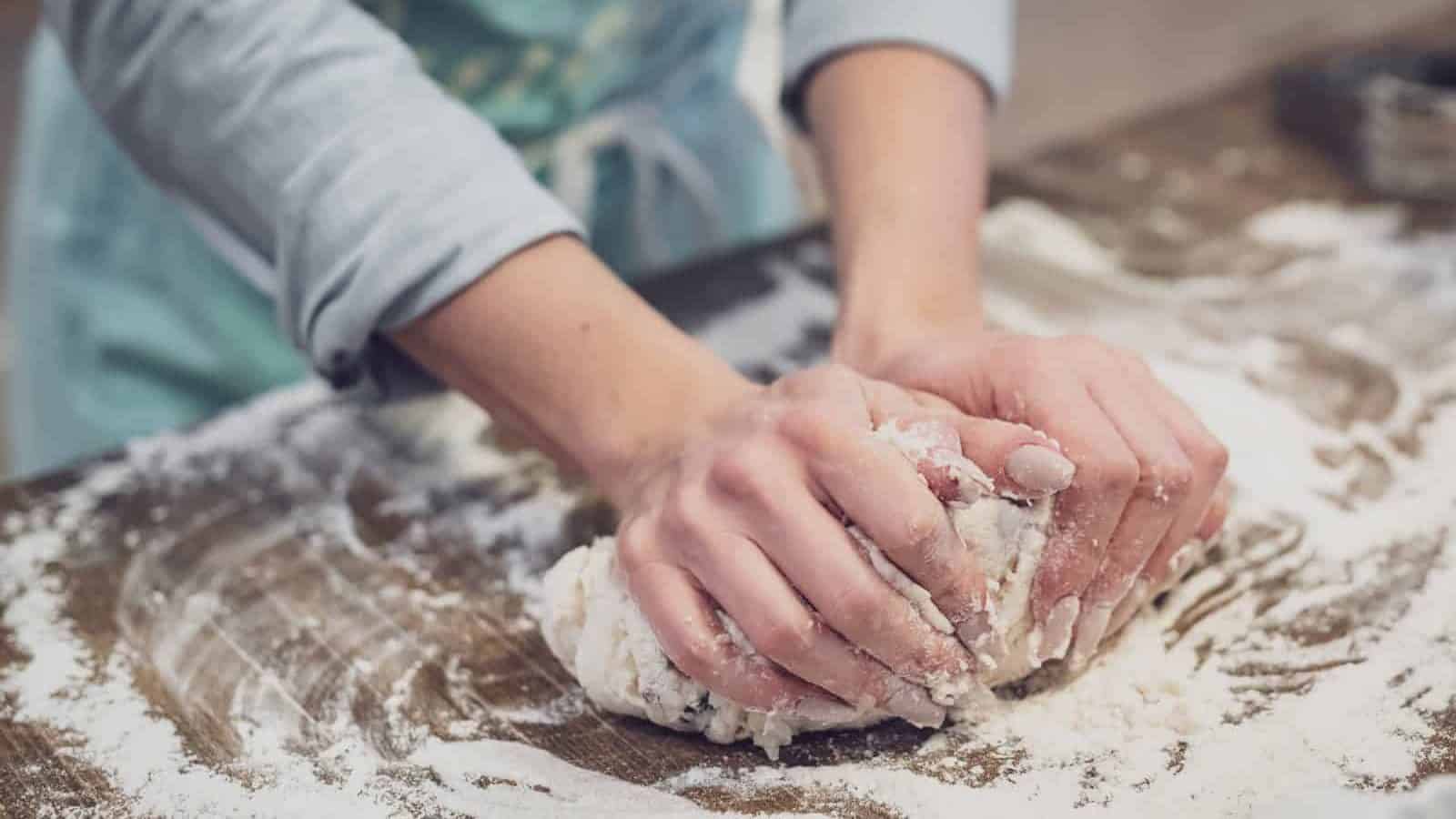 Baker making dough